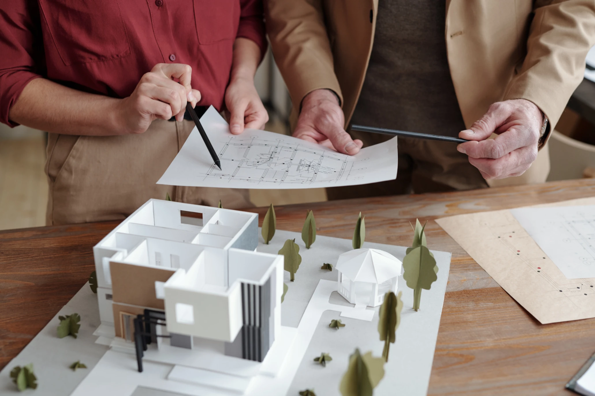 Discussing house plan with colleague 2023 11 27 05 16 19 utc
